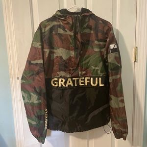 Camouflage Wind Breaker.